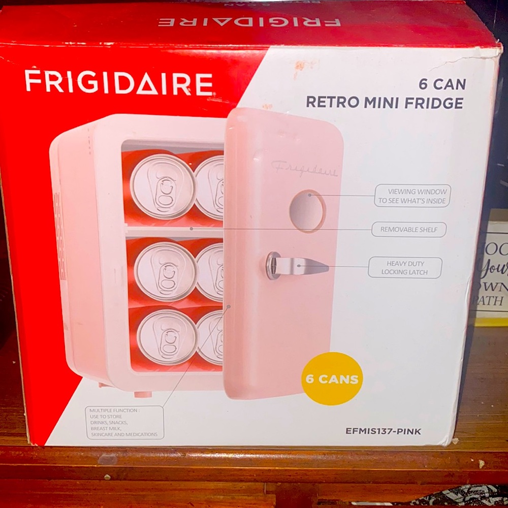 I’m selling a pink mini fridge.